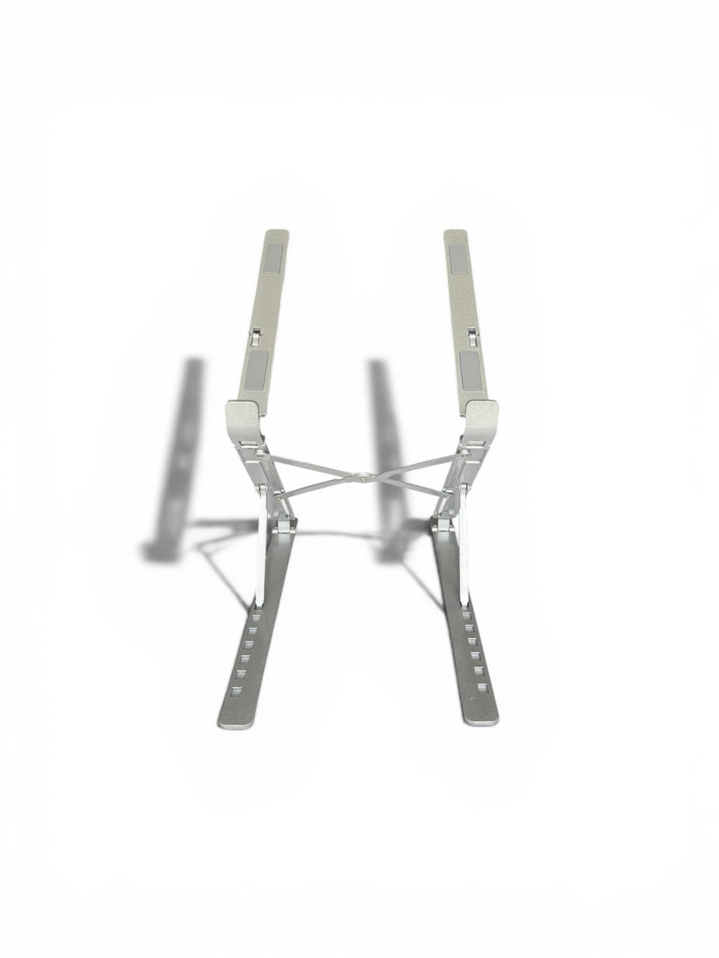 Stelo aluminum laptop stand with adjustable height notches on white background