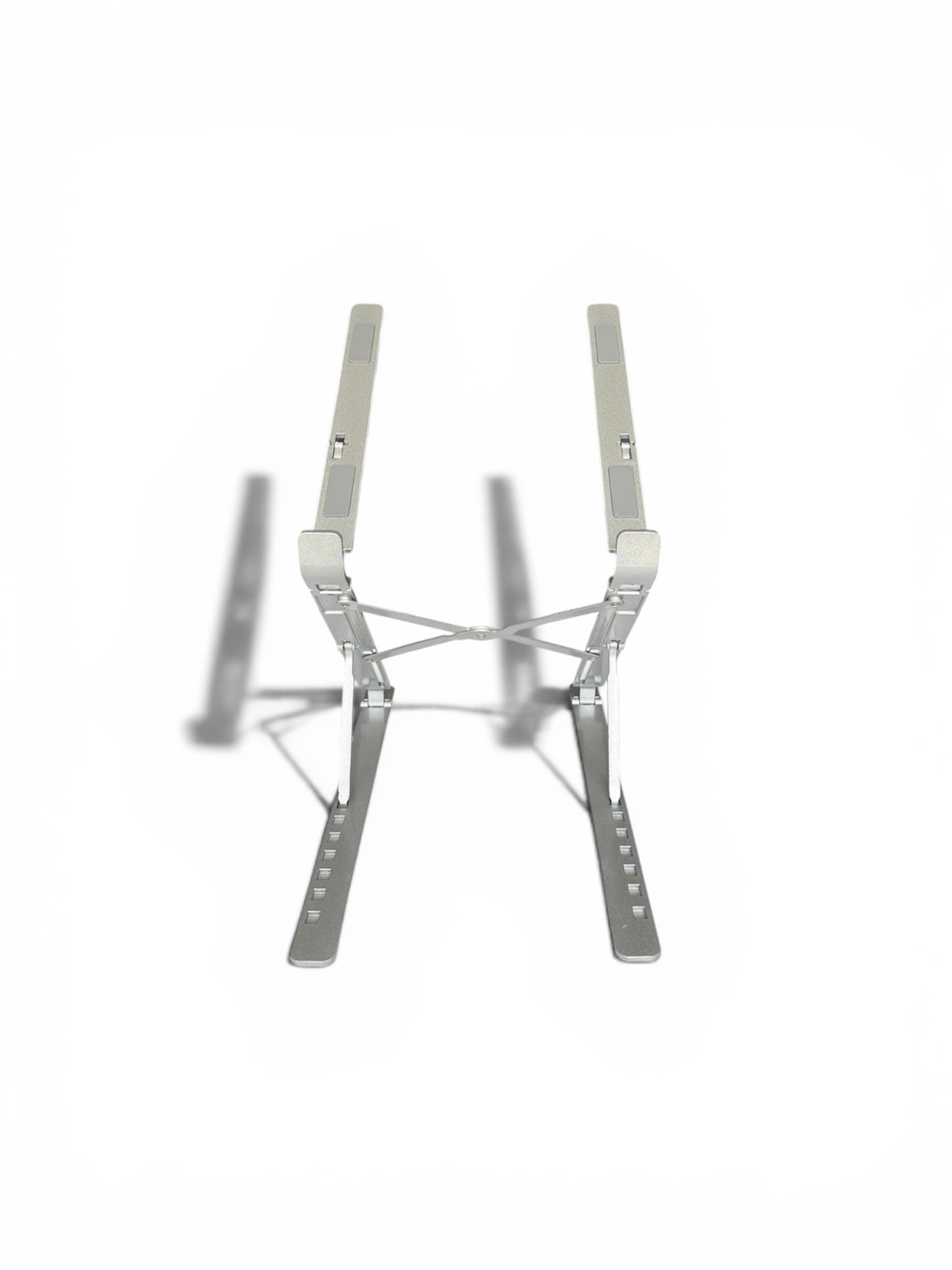 Stelo aluminum laptop stand with adjustable height notches on white background