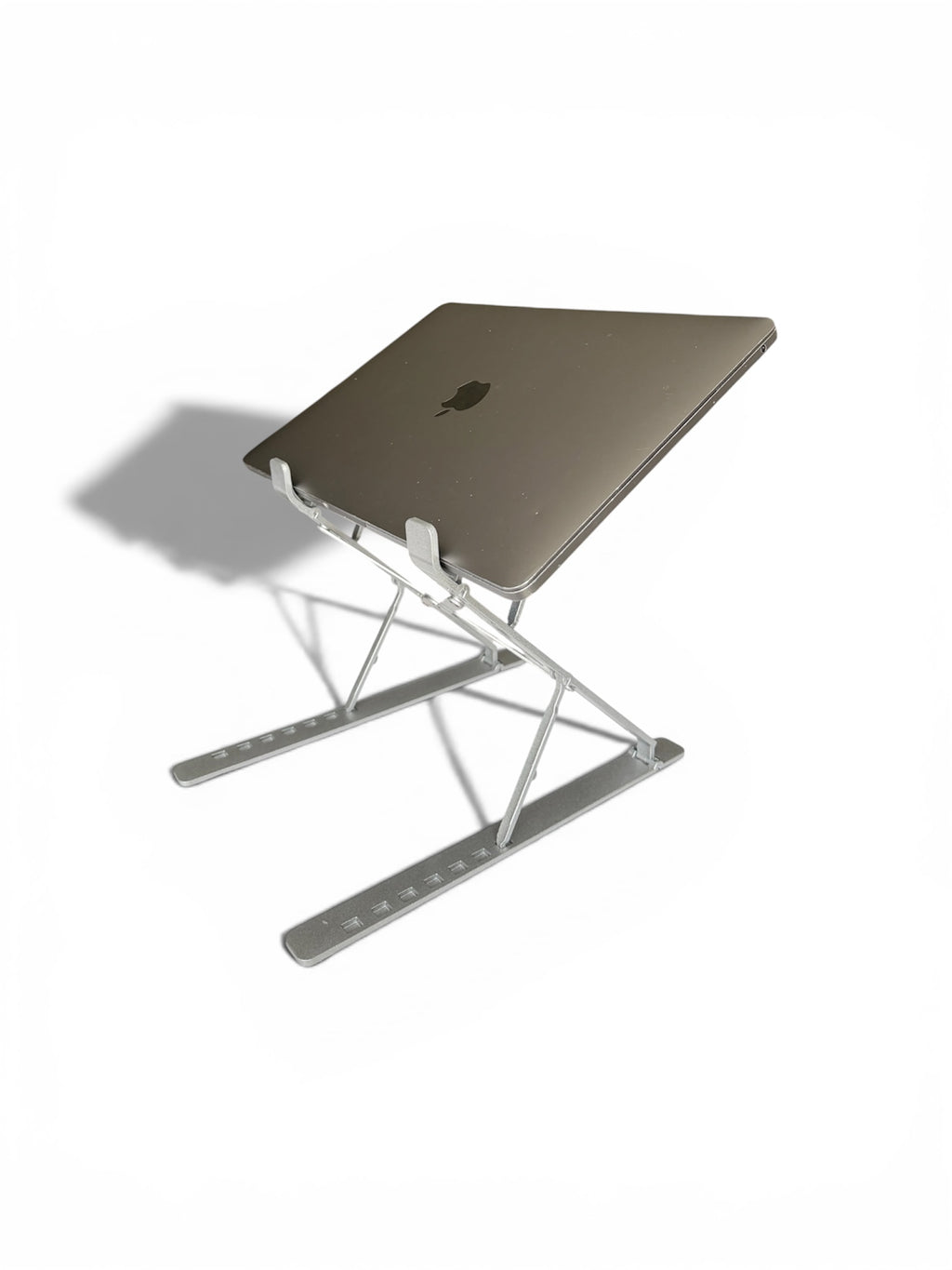 Stelo ergonomic laptop stand with MacBook Pro elevated for better posture