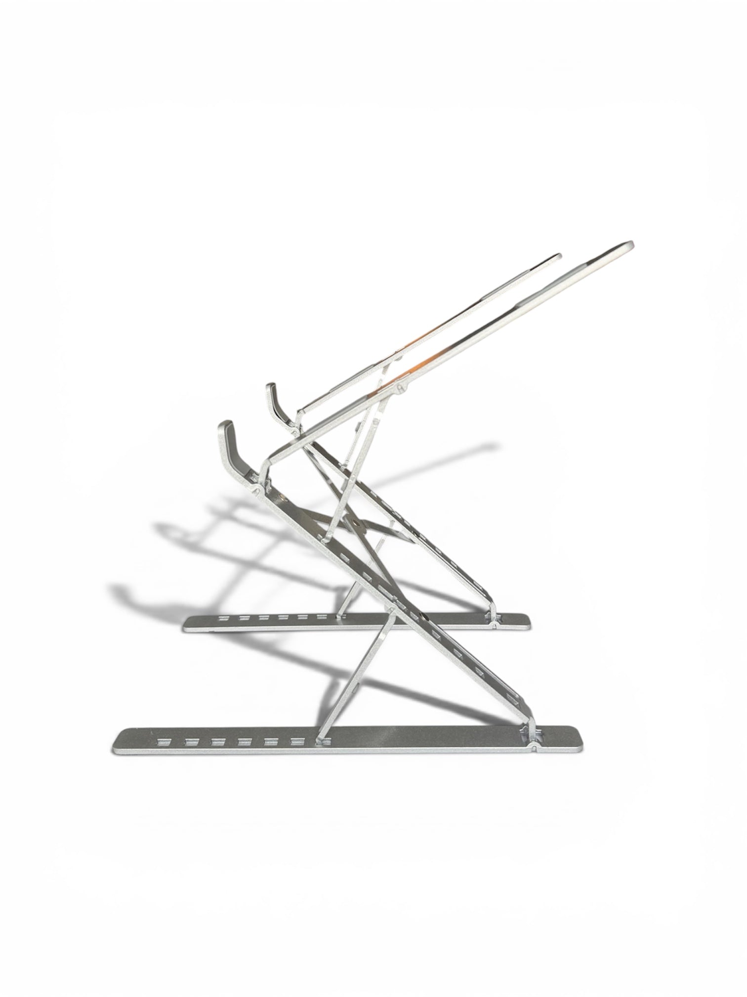 Stelo premium aluminum laptop stand with MacBook Pro at angled view