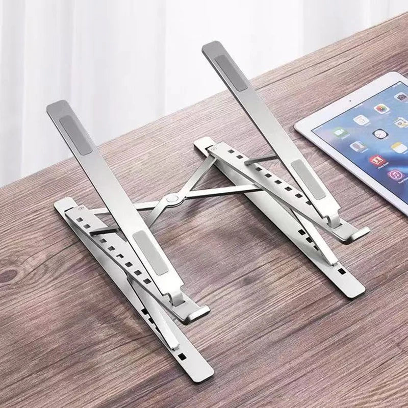 Stelo Ergonomic Laptop Stand — Adjustable Aluminum Riser for 10"-17" Laptops