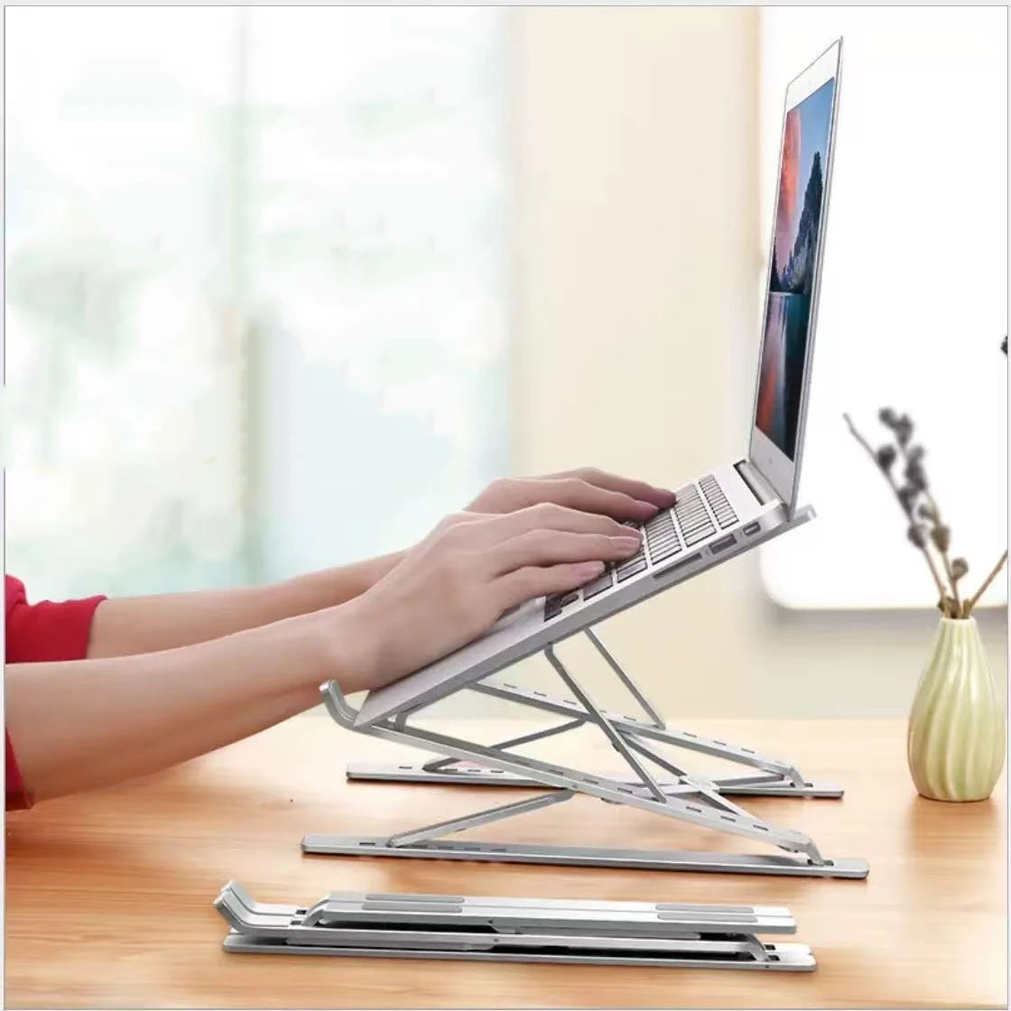 Stelo Ergonomic Laptop Stand — Adjustable Aluminum Riser for 10