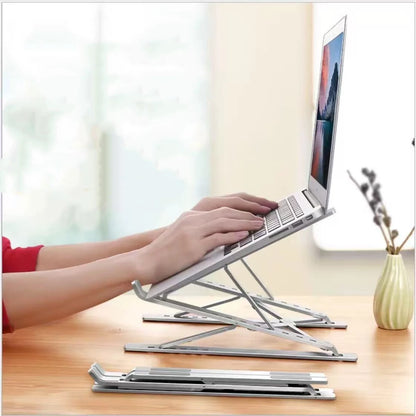 Stelo Ergonomic Laptop Stand — Adjustable Aluminum Riser for 10"-17" Laptops