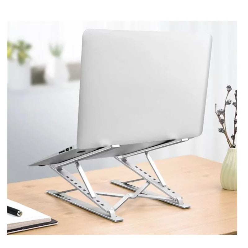 Stelo Ergonomic Laptop Stand — Adjustable Aluminum Riser for 10"-17" Laptops